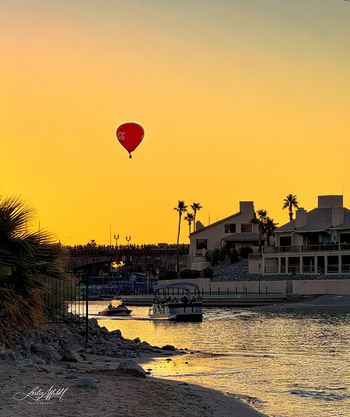 Red Balloon in the channel by Leslie Affeldt Photography
